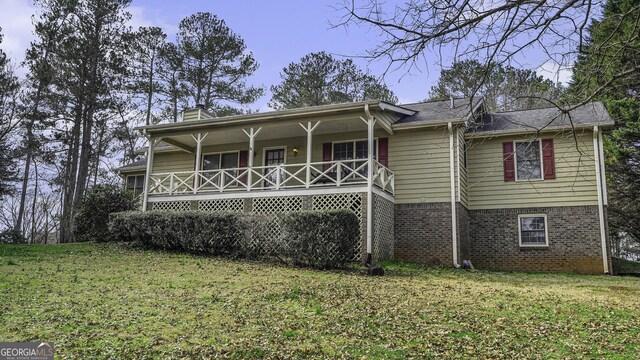 view of home's exterior featuring a yard and a garage