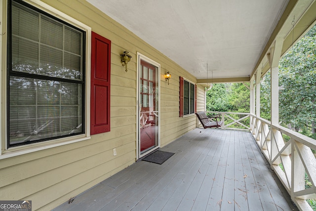 wooden terrace with covered porch