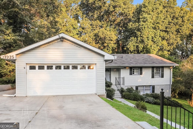 ranch-style home featuring a front lawn, brick siding, a garage, and a shingled roof