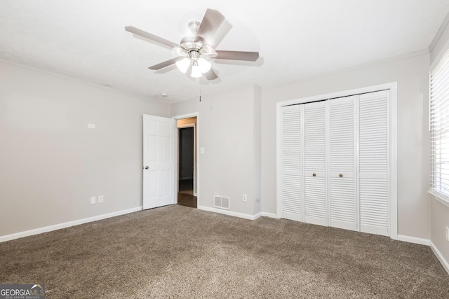 unfurnished bedroom with a ceiling fan, baseboards, visible vents, a closet, and carpet flooring