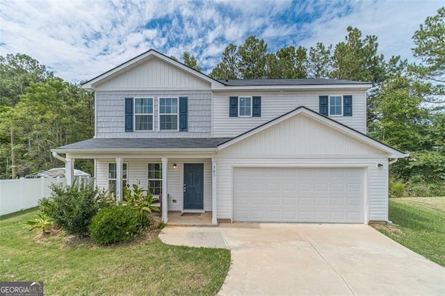 view of front of property featuring a garage, a porch, and a front lawn