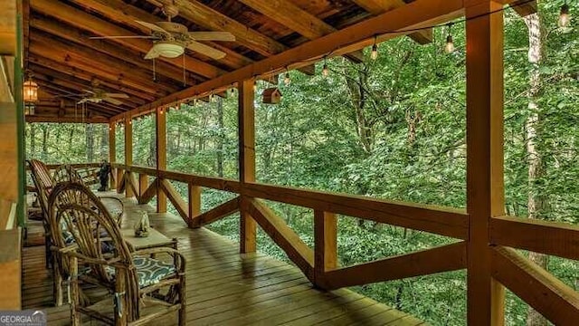 wooden terrace with ceiling fan