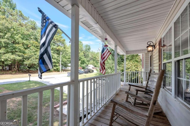 deck featuring a porch