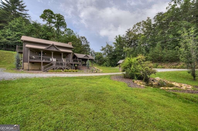 view of yard featuring a deck