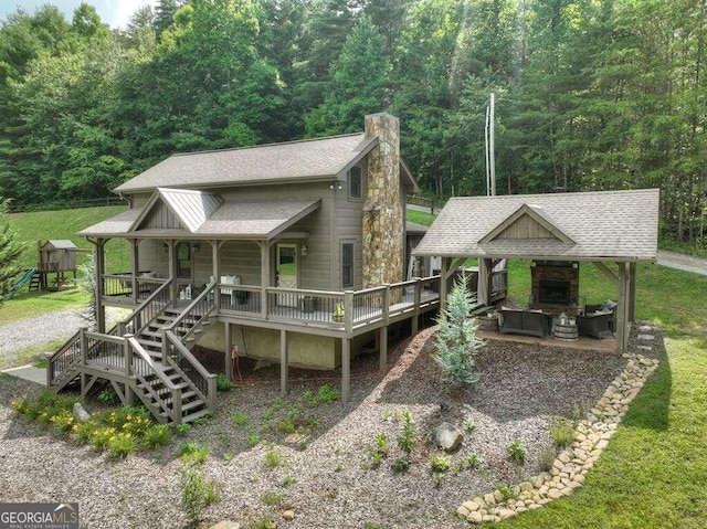 view of front of house featuring a front lawn and a gazebo