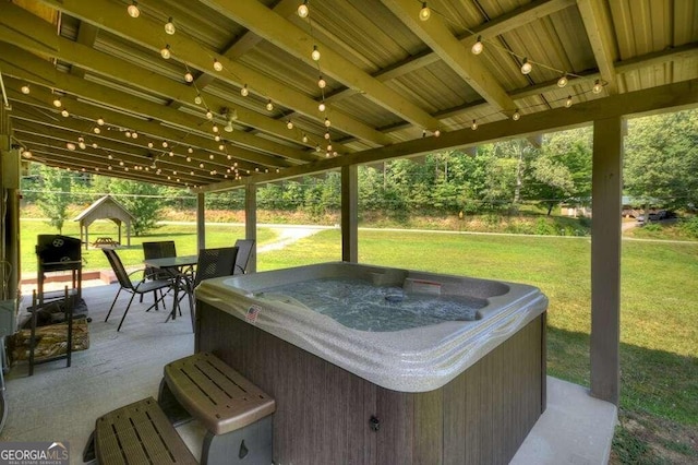 view of patio / terrace featuring a hot tub