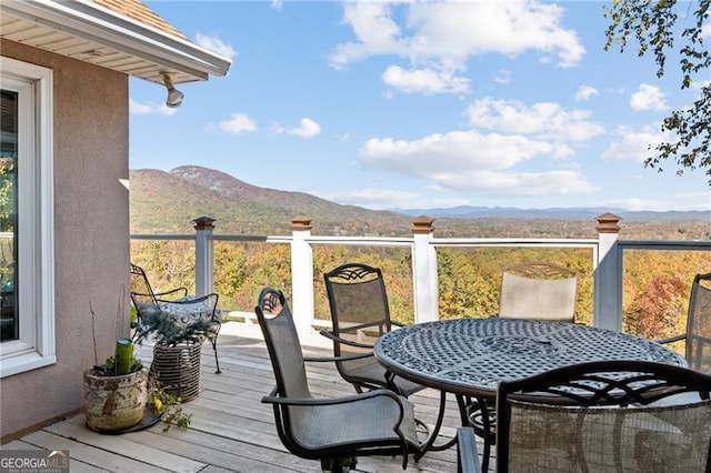 balcony featuring a deck with mountain view