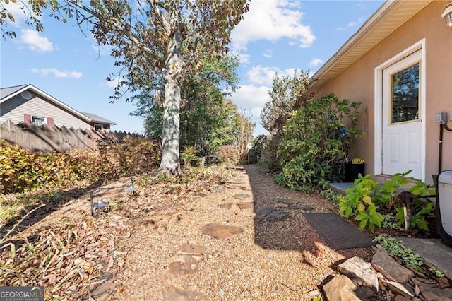 view of yard with fence