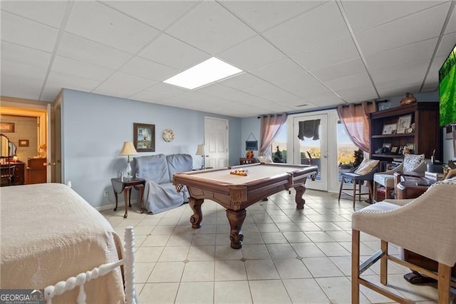 recreation room with light tile patterned floors, pool table, and a drop ceiling