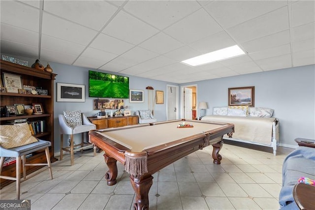 recreation room featuring light tile patterned floors, billiards, and a paneled ceiling