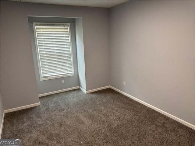 view of carpeted spare room