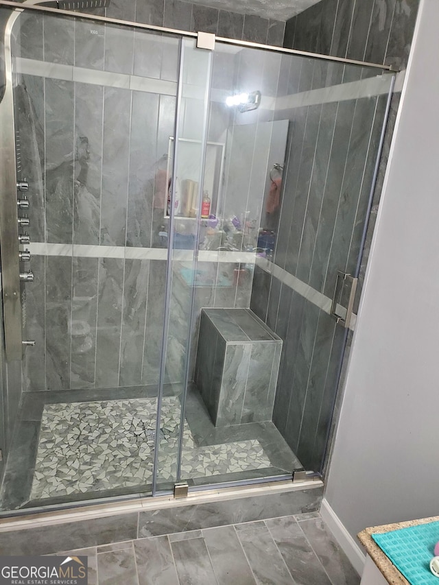 bathroom featuring walk in shower