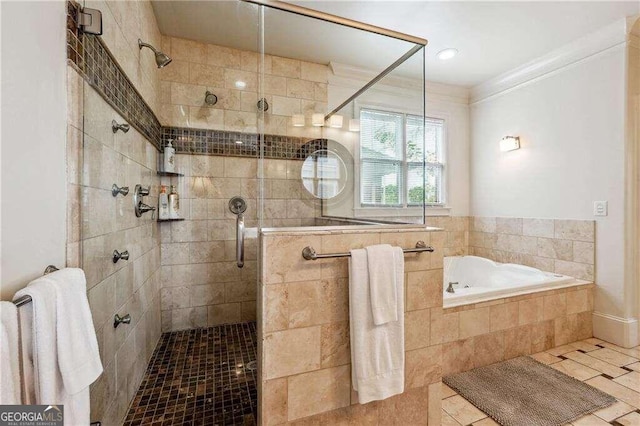 bathroom with separate shower and tub and tile patterned floors