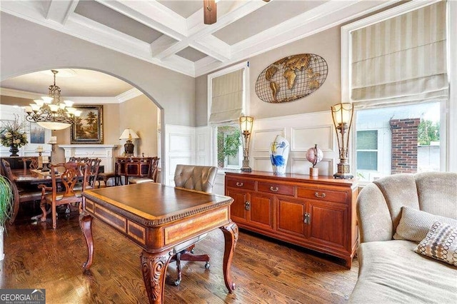 dining area featuring coffered ceiling, an inviting chandelier, dark hardwood / wood-style flooring, beam ceiling, and ornamental molding