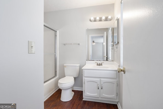 full bathroom featuring vanity, shower / bath combination with glass door, toilet, and wood-type flooring