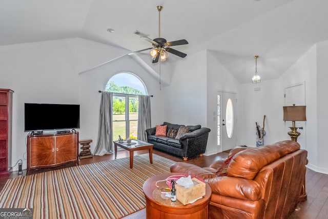 living area with lofted ceiling, ceiling fan, and wood finished floors