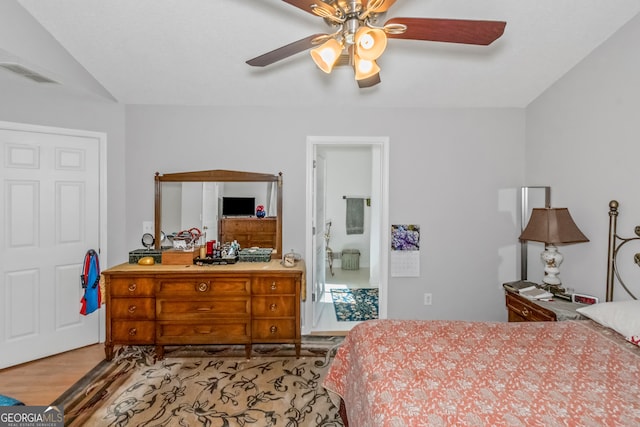 bedroom featuring lofted ceiling, ceiling fan, and light hardwood / wood-style floors