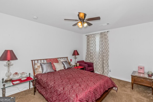 825 S Bethany Rd, Locust Grove, GA 30248 - bedroom with carpet floors and ceiling fan