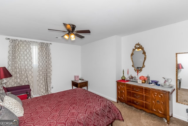 bedroom featuring ceiling fan and light colored carpet