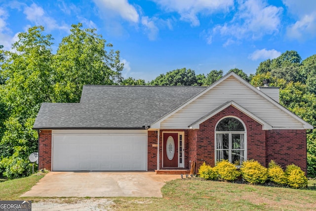 view of front of home with brick siding, a garage, concrete driveway, a chimney, and a shingled roof