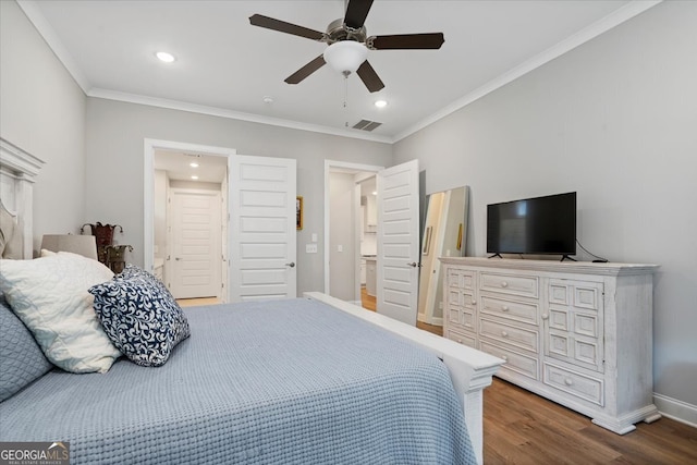 bedroom featuring crown molding, ceiling fan, ensuite bath, and wood-type flooring