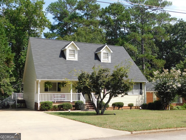 cape cod-style house featuring a porch and a front yard