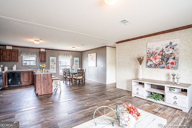 living room featuring dark hardwood / wood-style floors and crown molding