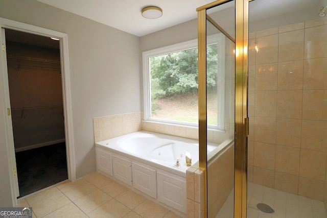 bathroom with plus walk in shower and tile patterned floors