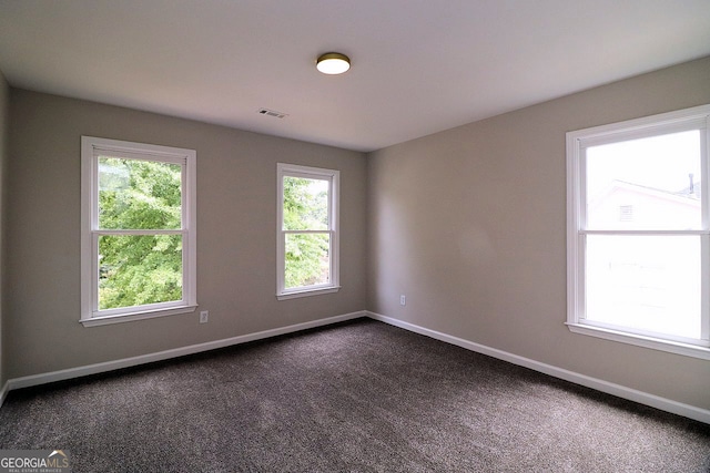 view of carpeted spare room