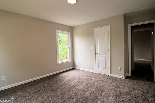 unfurnished bedroom with carpet flooring