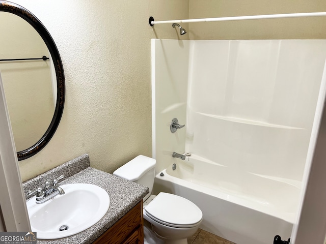 full bathroom with shower / bathtub combination, toilet, and vanity