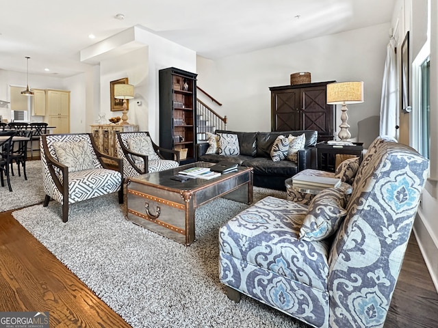 living room featuring dark hardwood / wood-style floors