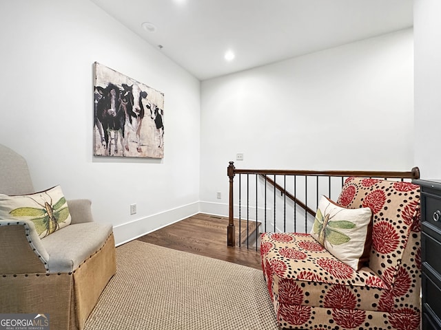 living area with dark hardwood / wood-style flooring