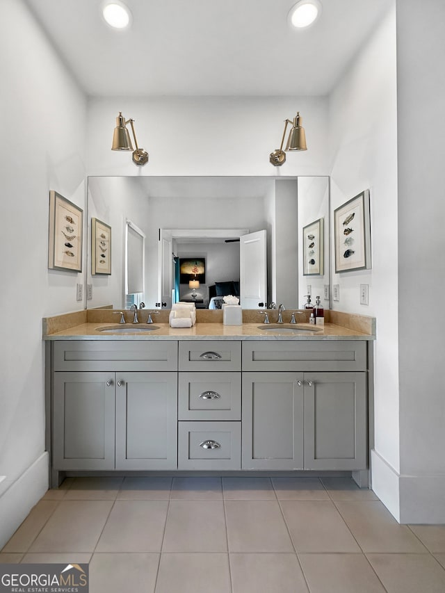 bathroom with vanity and tile patterned floors