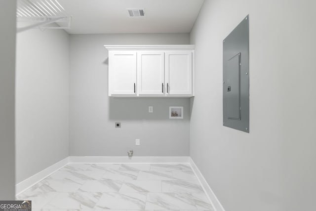 laundry area with gas dryer hookup, cabinets, electric panel, washer hookup, and hookup for an electric dryer