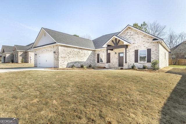 view of front of house with a garage and a front lawn