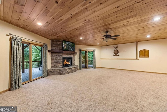 unfurnished living room with wood ceiling, carpet flooring, and plenty of natural light