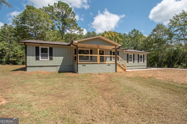 view of front facade with a porch and a front yard