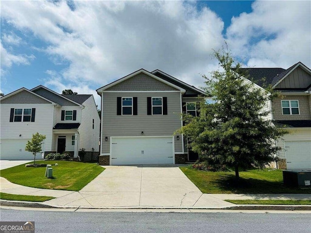 craftsman-style house with a garage and a front yard