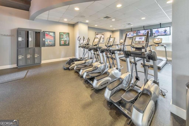 gym featuring a drop ceiling