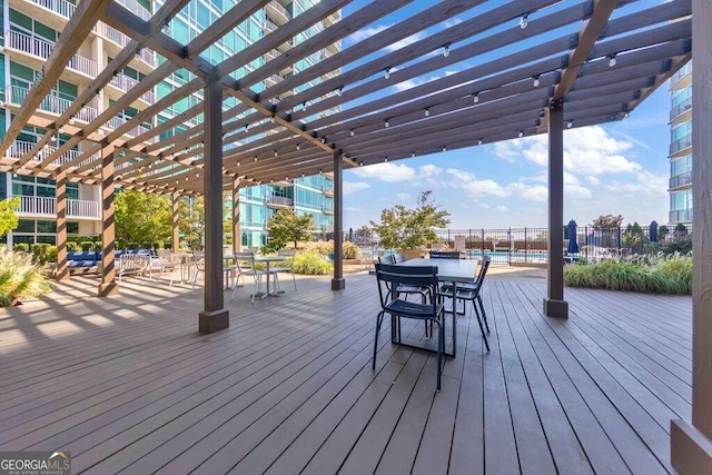 wooden terrace featuring a pergola