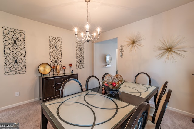 carpeted dining room with an inviting chandelier