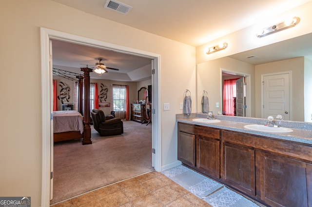 bathroom with vanity, ceiling fan, and tile patterned floors