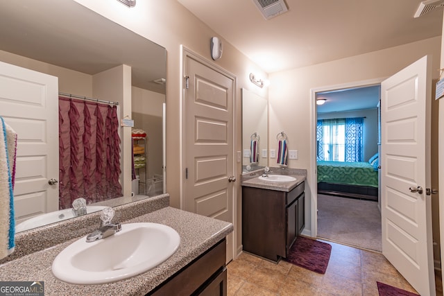 bathroom with a shower with curtain and vanity