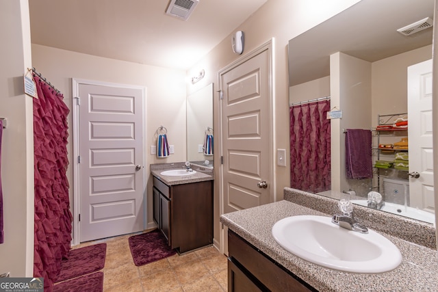 bathroom featuring vanity and tile patterned floors