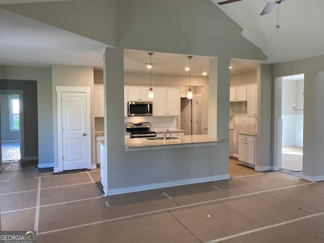 kitchen with ceiling fan, light stone counters, pendant lighting, white cabinets, and appliances with stainless steel finishes