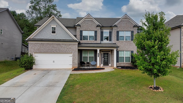 craftsman-style house with brick siding, a front lawn, an attached garage, and concrete driveway