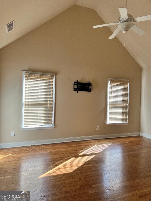 interior space featuring hardwood / wood-style floors, ceiling fan, and lofted ceiling