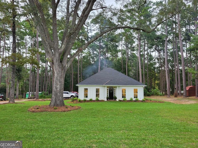 view of property exterior with a yard