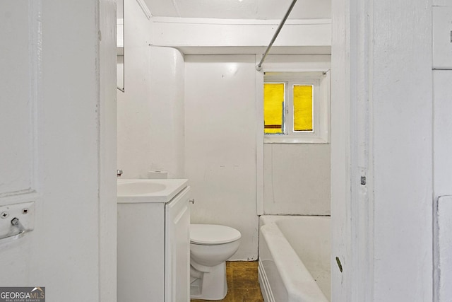 full bathroom featuring toilet, vanity, and a bath